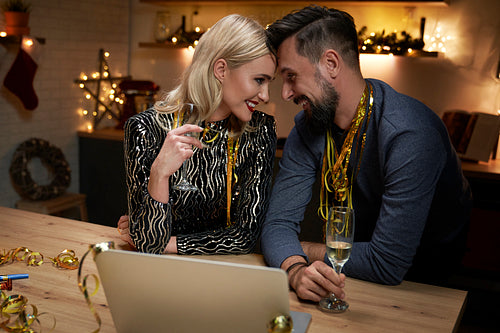 Couple in love celebrating New Year's Eve at home