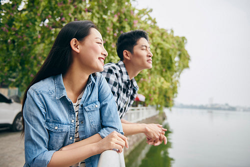 Young Vietnamese couple enjoying the view in the city