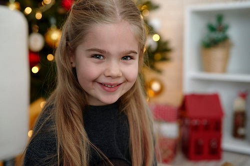 Close up portrait of cute girl at Christmas time.