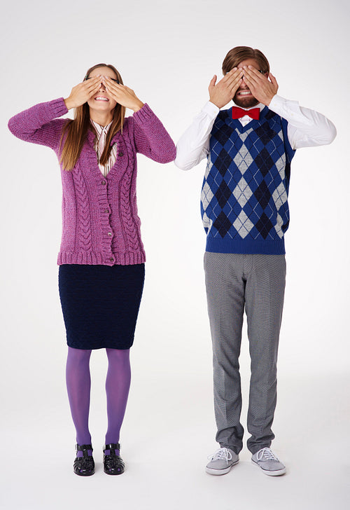 Couple geek covering eyes by hands