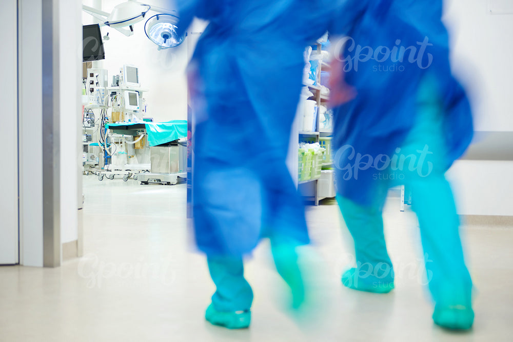 Doctors running in a hurry