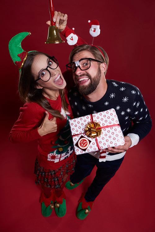 Couple announcing the onset of Christmas