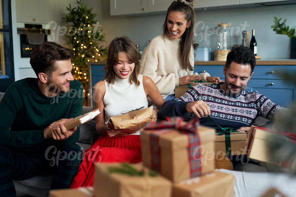 Friends and boxes with Christmas presents