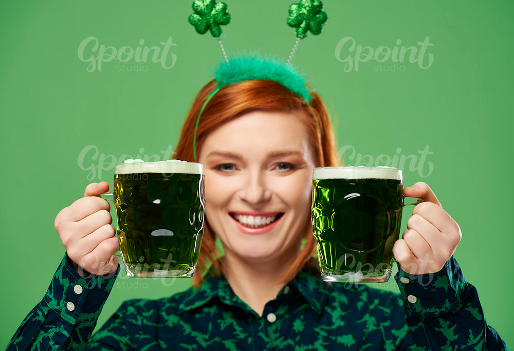Woman making a toast to Saint Patrick's Day