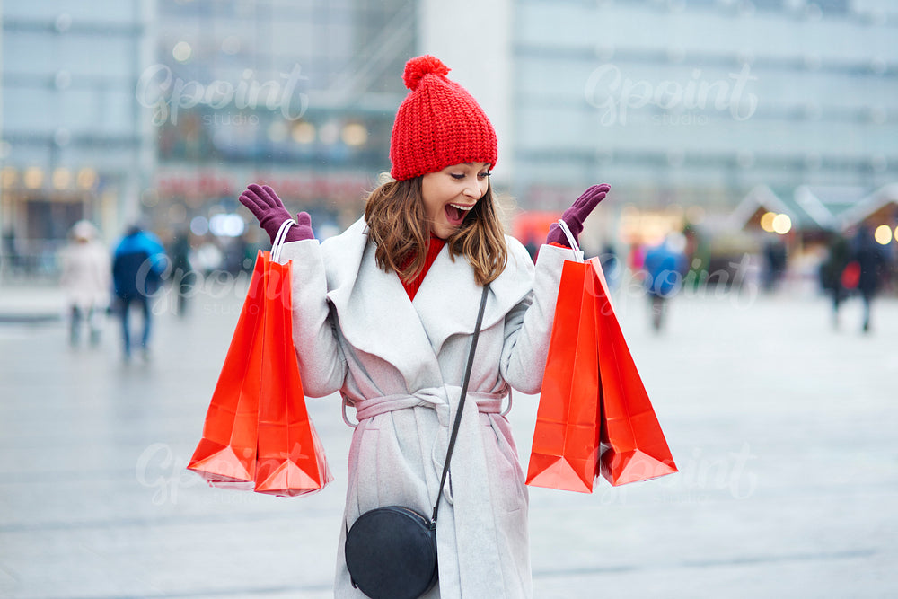 Beautiful women with bags during the Christmas shopping