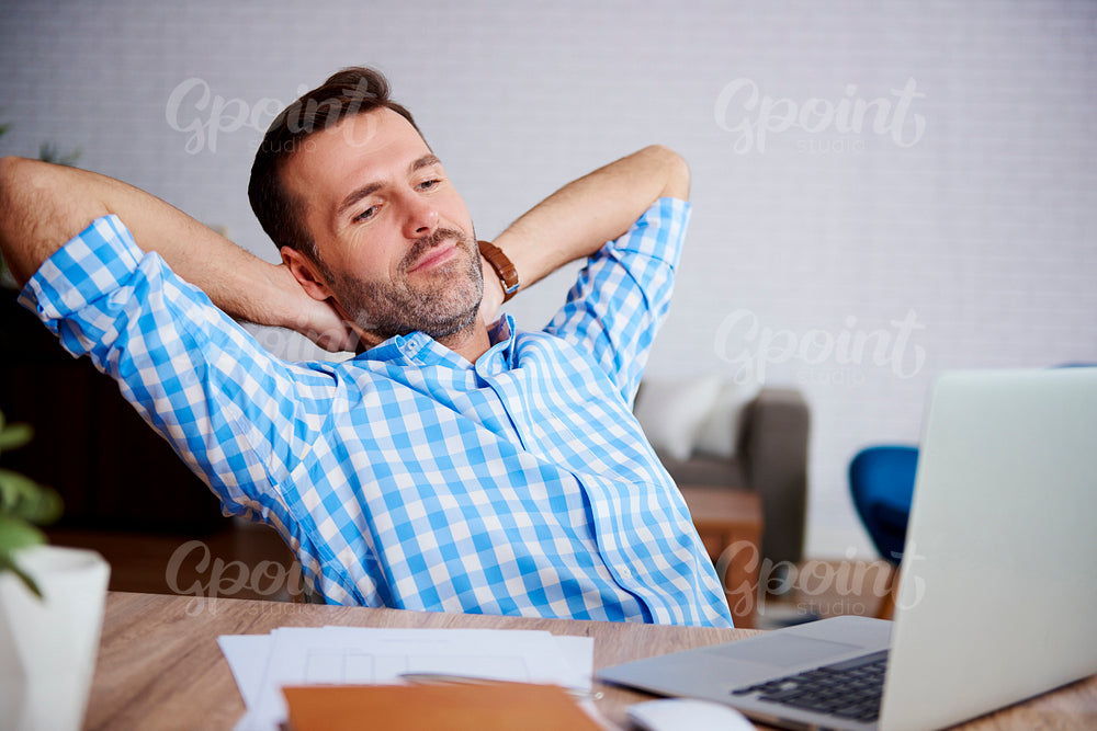 Mature man resting in his office