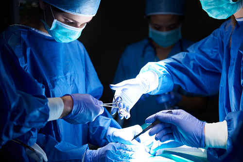 Surgeon getting ready to operate on a patient