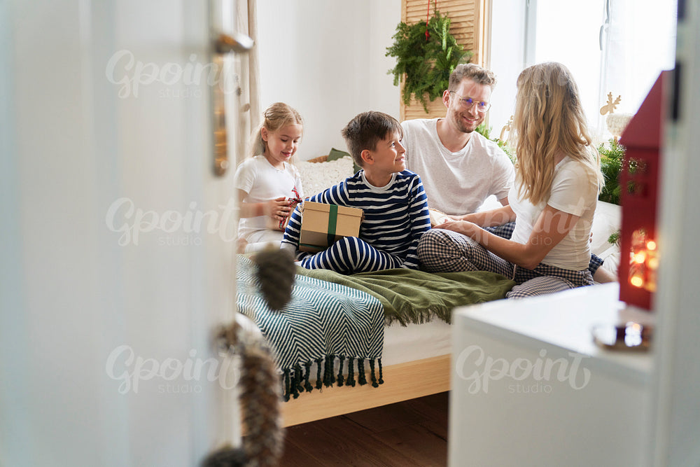 Family spending Christmas morning together