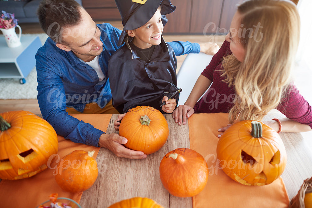 High angle view on family over halloween table