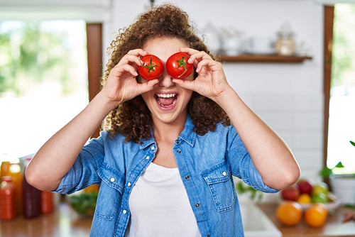 Both eyes covered with tomatoes
