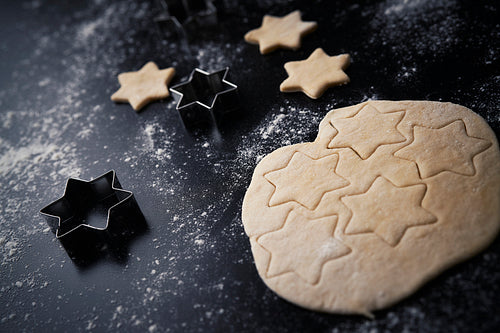 Close up of raw cookies in the shape of stars