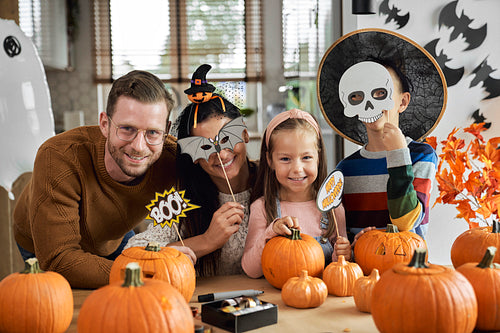 Portrait of happy family at Halloween