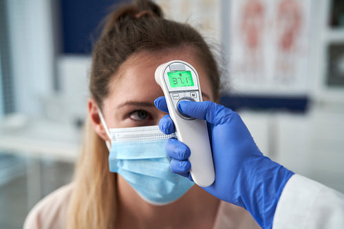 Close up of woman with increased temperature during the test