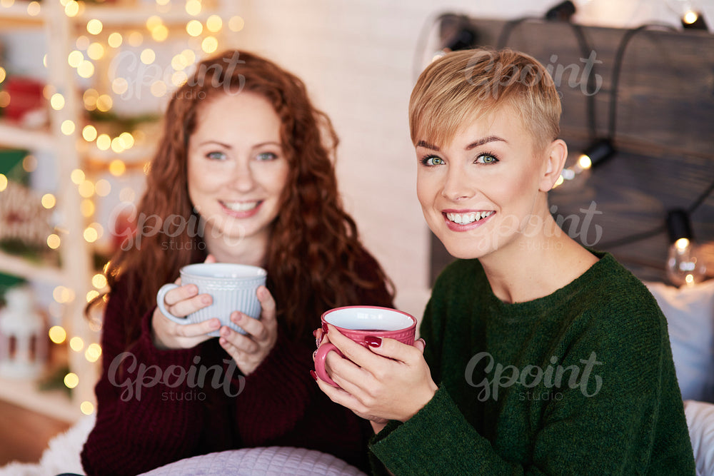 Portrait of beautiful woman drinking hot tea