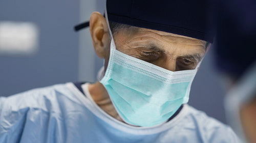 Close up of surgeon during hard operation